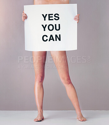 Buy stock photo Body, poster and person with paper in studio for billboard, motivation and support on white background. Nude, banner and sign with text in advertising for empowerment, inspiration and announcement