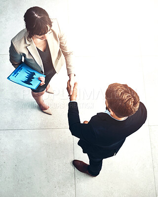 Buy stock photo Above, handshake and business people B2B welcome together for meeting in corridor with partnership and collaboration. Professional, deal and corporate employee contract in an office shaking hands