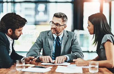 Buy stock photo Office, meeting and business people with documents in discussion for finance review, idea and feedback. Employees, teamwork and accountant with conversation for audit report, budget and solution