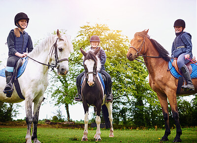 Buy stock photo Equestrian girls, friends and horse in portrait, smile and outdoor for hobby, fun and bonding for show. Teen jockey, animal and happy with countryside, farm and ranch riding together for care