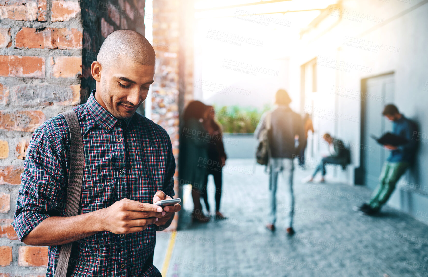 Buy stock photo Man, student and outdoor with phone, reading and typing for communication on mobile app in city. Person, smartphone and texting on metro sidewalk for commute to university with social media in Mexico