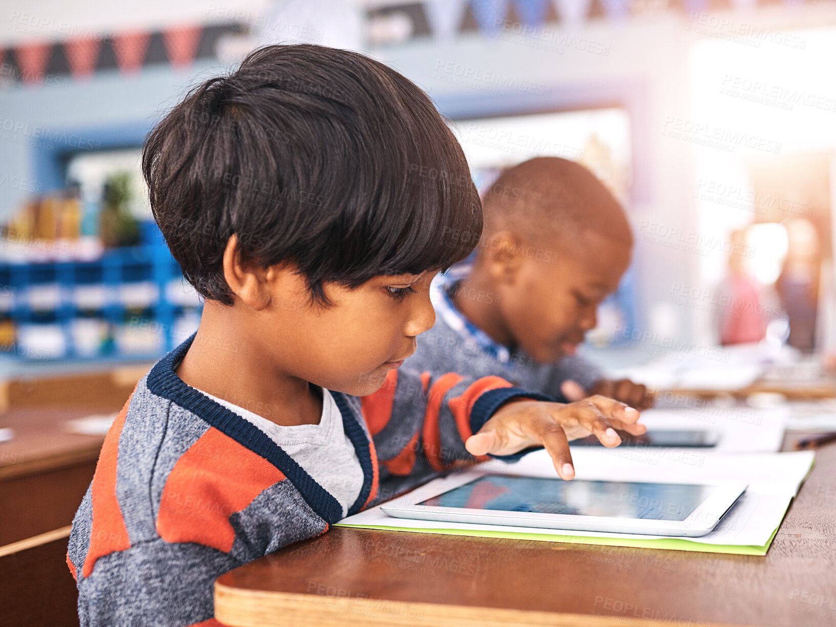 Buy stock photo Tablet, school and child with books in classroom for online learning, studying and knowledge. Education, academy and young boy with textbooks and digital tech for lesson, development and research