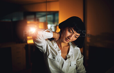 Buy stock photo Asian woman, neck pain and injury in night at office with bad posture, tired or muscle fatigue at startup. Person, hurt or burnout with massage, joint or exhausted at creative agency in South Korea