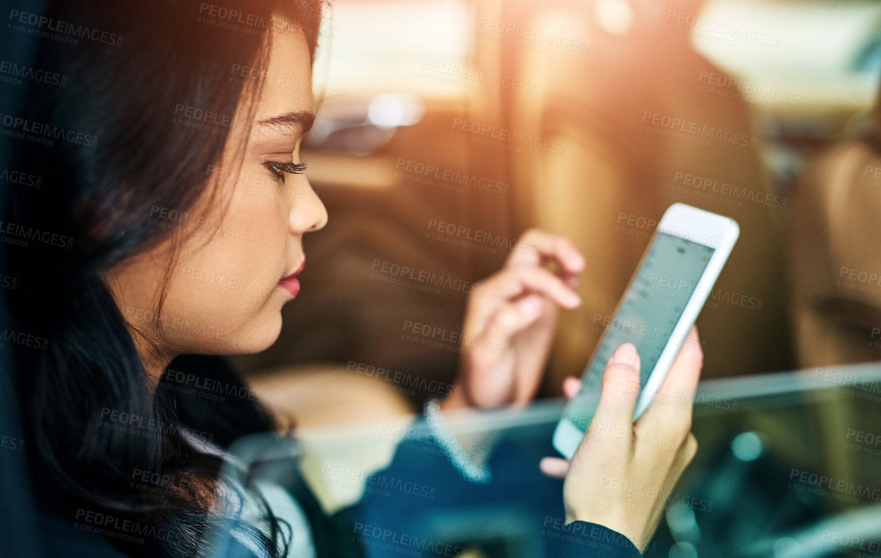 Buy stock photo Travel, passenger and woman with phone in car for online network, communication and reading message. Taxi, journey and female person with tech in vehicle for location, update and sharing trip info