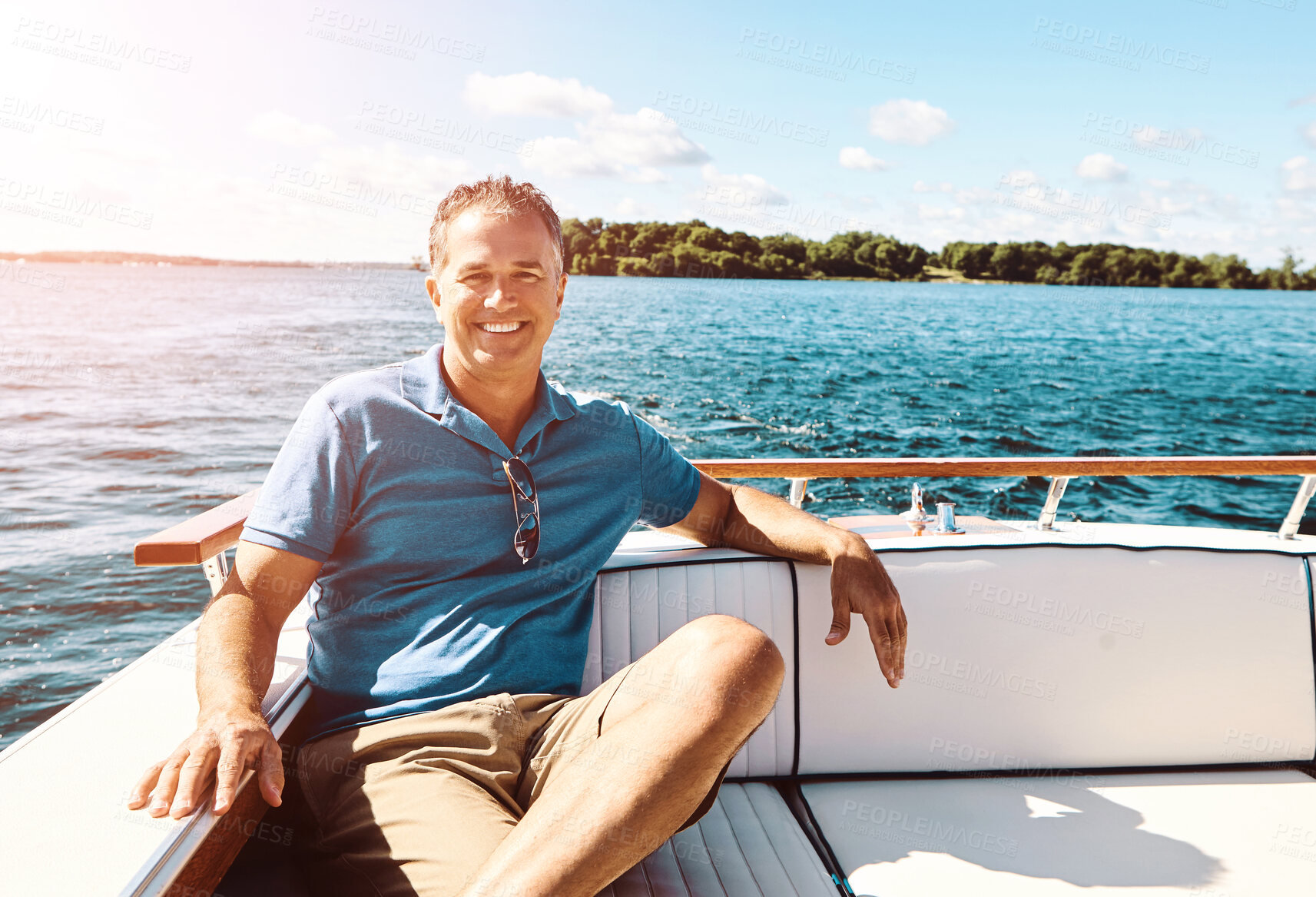 Buy stock photo Portrait, mature man and boat on vacation for travel, sailing and adventure journey on ocean transport. Smile, male person and relax on yacht ship for holiday cruise, sea and tropical Greek island