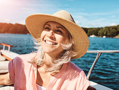 Buy stock photo Mature woman, retirement and boat cruise for travel, leisure and holiday on ocean with relax. Female person, journey and happy on luxury yacht at sea for view, vacation or tropical adventure sailing