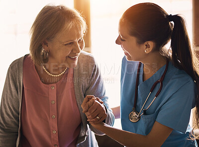 Buy stock photo Nurse, senior woman and holding hands for support, smile and comfort with happiness, bonding together and healthcare. Caregiver, patient or old lady with wellness, compassion and consultation in home