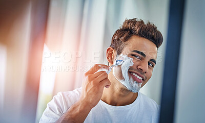 Buy stock photo Home, mirror and man with shaving foam, dermatology and grooming routine for beard. Person, bathroom and guy with reflection, treatment and cream for self care, cosmetics and cleaning facial hair