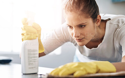 Buy stock photo Spring cleaning, kitchen and woman with detergent, home and equipment for counter, spray and hygiene. House, product and bottle of chemical, gloves and person with scrub for protection of germs