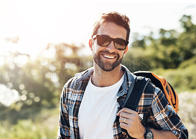 Buy stock photo Smile, nature and man hiking on vacation for adventure, travel or journey with backpack in New Zealand. Happy, sunglasses and male person trekking on outdoor trial or path on holiday or weekend trip.