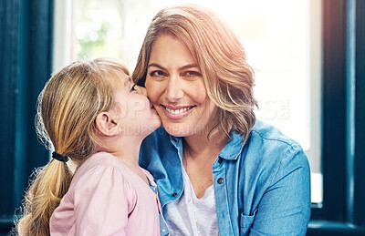 Buy stock photo Smile, woman and child kiss cheek at house for love, bonding and comfort relationship with care on mothers day. Happy, parent and girl embrace together for support, trust and security in living room