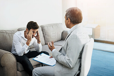 Buy stock photo PTSD, therapy or trauma with counsellor and patient in office of hospital for grief, loss or pain. Depression, psychology and stress with man talking to mental health doctor for counseling or rehab