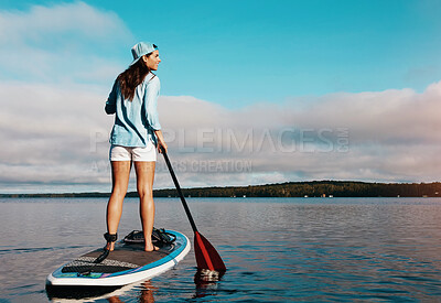Buy stock photo Woman, lake and happy for paddleboard on holiday with adventure, recreation and fun in Bali. Female person, smile and travel for summer vacation, journey and break to relax with fitness activity