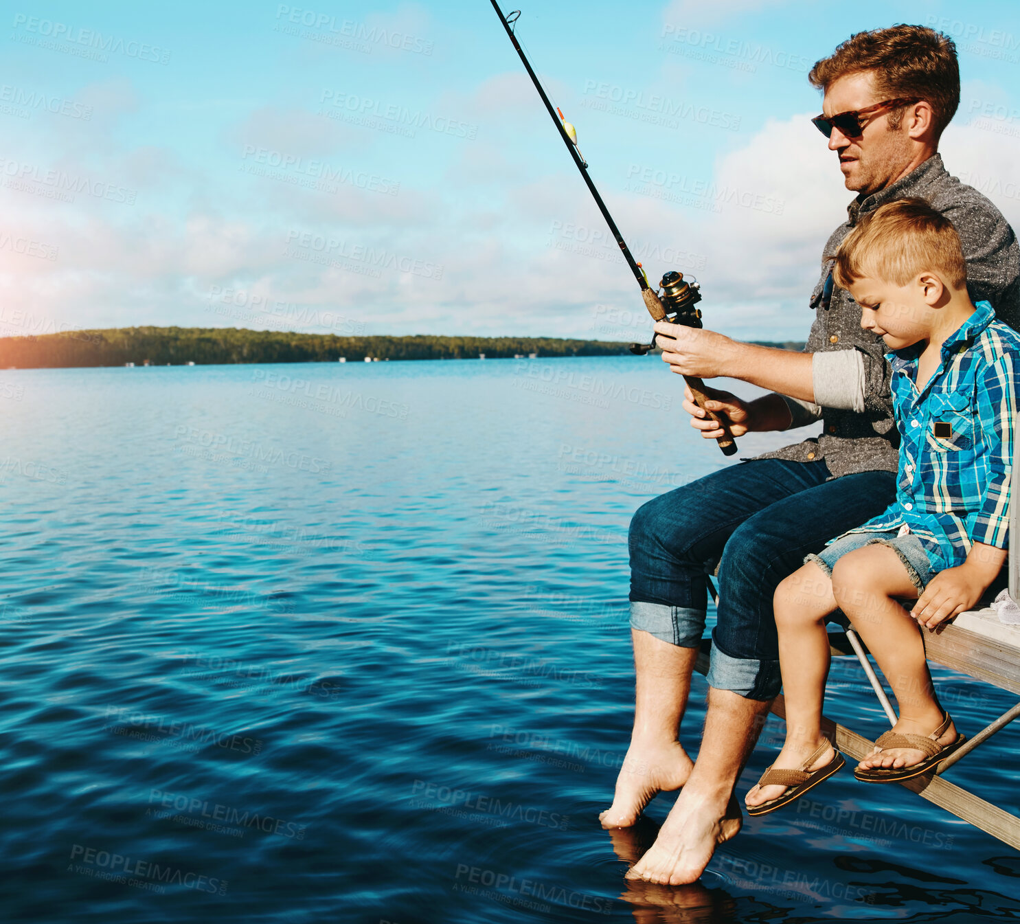 Buy stock photo Father, boy child and fishing in summer at lake for vacation, together and relax in morning. Family, fisherman and kid in nature by water for holiday, learning or gear for outdoor adventure on pier 