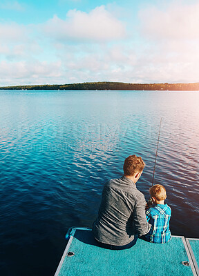 Buy stock photo Back, father and fishing with son, water and outdoor in ocean, adventure and activity for enjoyment. Hobby, bonding and dad with lesson on trip or vacation in nature with parent teaching boy child