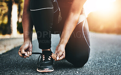 Buy stock photo Person, fitness and tie shoes with hands on street for running, morning workout or outdoor exercise. Closeup of active athlete or runner tying laces in preparation or getting ready for cardio on road