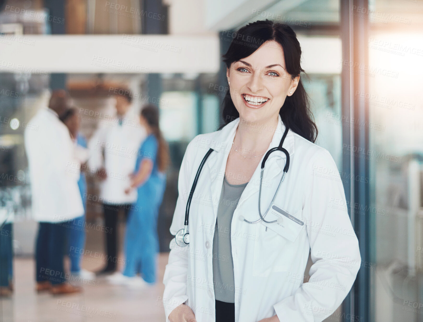 Buy stock photo Portrait, happy woman and confident doctor in clinic for healthcare services, career and medicine. Face, medical professional and proud physician with smile at wellness hospital ready for work