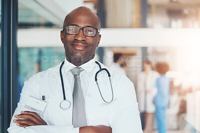 Buy stock photo Doctor, portrait and confidence of black man for healthcare, wellness or medical experience with stethoscope. Hospital, smile and pride in health facility with crossed arms for cardiology or medicine