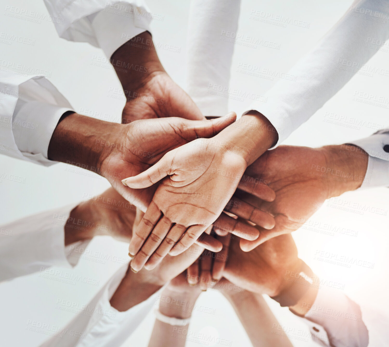 Buy stock photo Below, hands stack and medical people in hospital for healthcare support, solidarity and teamwork of workforce motivation. Staff, diversity and collaboration, trust and synergy together of clinic