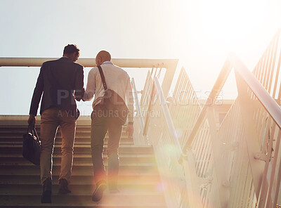 Buy stock photo Business, men and walking on stairs outdoor for commute to work with communication, flare and friends. People, back and travel together on steps in city for conversation, networking and partnership