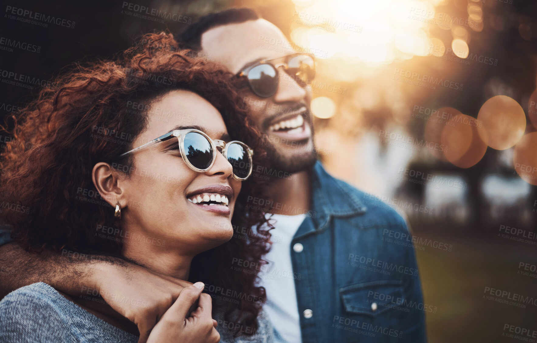 Buy stock photo Love, hug and couple in park, sunglasses and romance with relationship, support and bonding together. Outdoor, embrace or happy man with woman, peaceful and vacation with adventure, trust or kindness