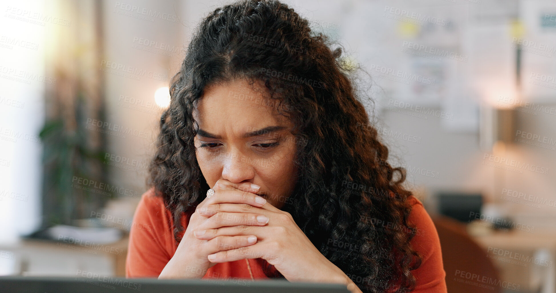 Buy stock photo Reading, woman and laptop at desk with stress, deadline and bad news in office. Female journalist, worry and frustrated at computer for review, article and anxiety in modern workplace in city