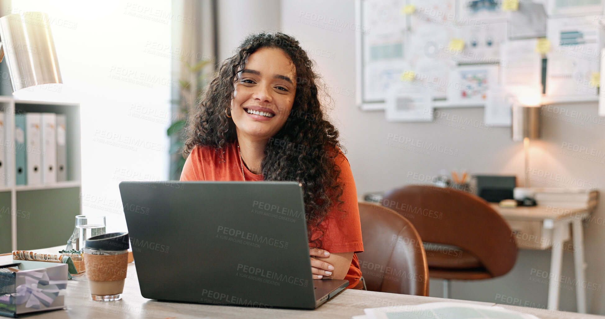 Buy stock photo Portrait, woman and smile at desk with laptop, communication and update in office. Female journalist, confident and happy at computer for article, social media and contact in modern workplace in city