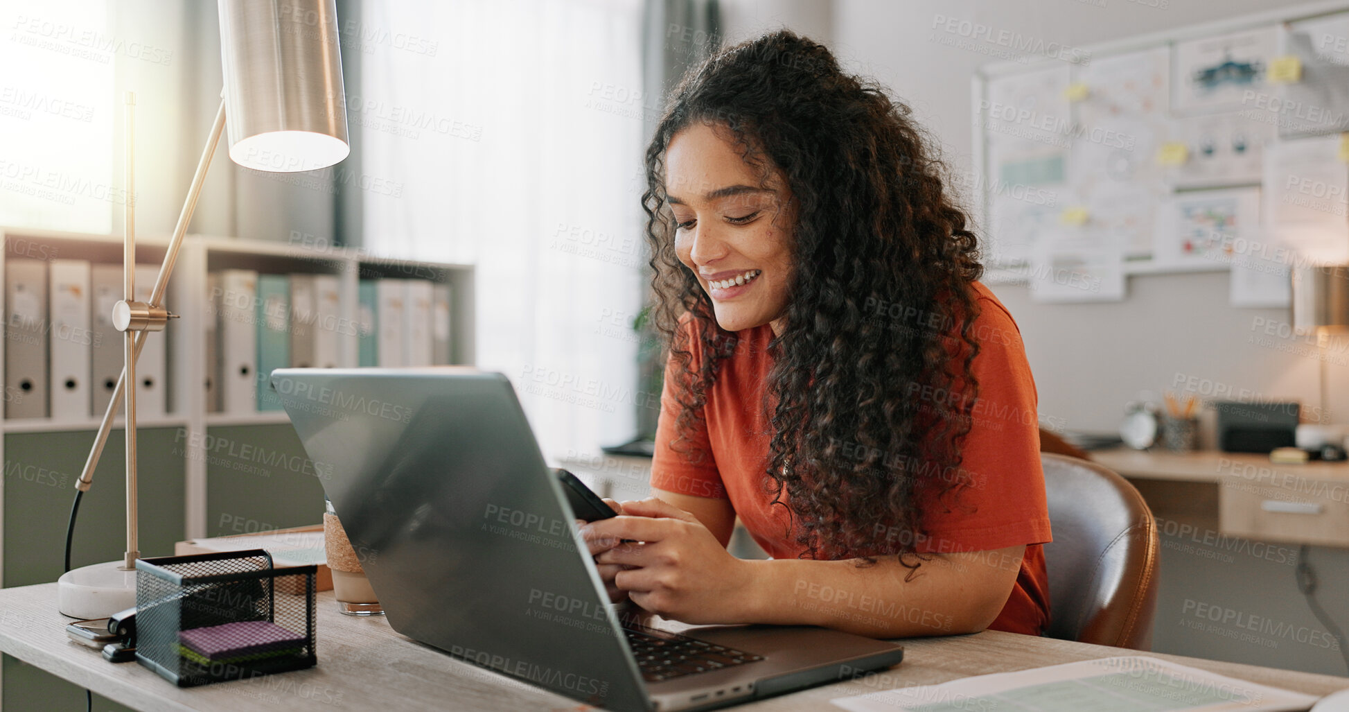 Buy stock photo Business woman, laptop and smile for phone, communication and networking for startup in office. Happy, female employee event planner checking email on computer, social media and post on smartphone