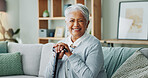 Woman, senior and portrait with cane on sofa, walking support and assistance stick in retirement home on weekend break. Smile, happiness and elderly female person with a disability, wellness and help