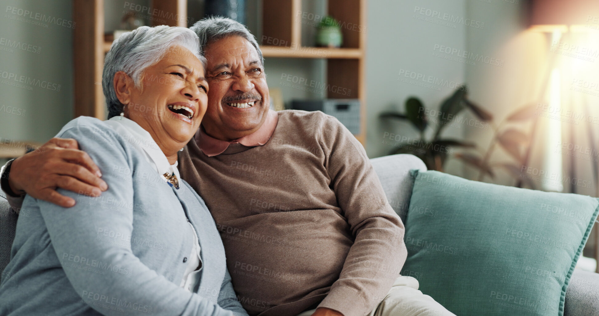 Buy stock photo Senior, couple and hugging on sofa in home together, elderly apartment and care with married people for love. Relationship, commitment and pensioners in retirement relax on couch for bonding