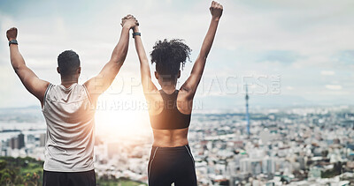 Buy stock photo People, runner and victory or back with city, celebration and arm for achievement or fitness goals together. Outside, marathon training and exercise with athlete, friends and wellness and proud