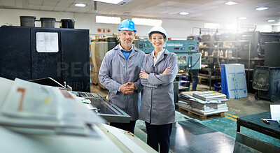 Buy stock photo Man, woman and arms crossed in portrait at factory for printing by machine, maintenance and production at job. People, smile and helmet in industrial warehouse for design, brochure or team for paper