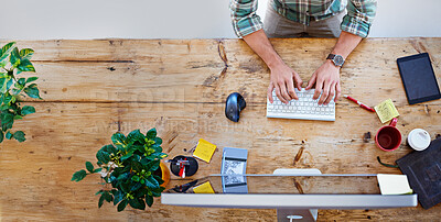 Buy stock photo Top view, hands and business with man, computer and typing with keyboard, graphic designer and connection. Above, person and entrepreneur at desk, pc and internet with creative agency and consulting