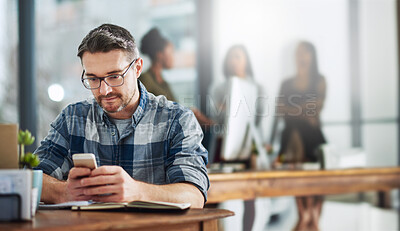 Buy stock photo Business, typing and man at desk, smartphone and internet with social media, connection and online reading. Employee, creative agency and consultant with cellphone, texting and digital app for game