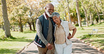 Love, happy and senior couple in park for walk, exercise and fitness in retirement in nature or forest. Partner, diverse and support or trust for man and female person, care and hug or embrace