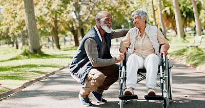 Buy stock photo Senior, man and woman with disability in park for fresh air, walking and enjoyment of retirement or wellness with love. Couple, talk and outdoor in nature garden for bonding, together and happiness.