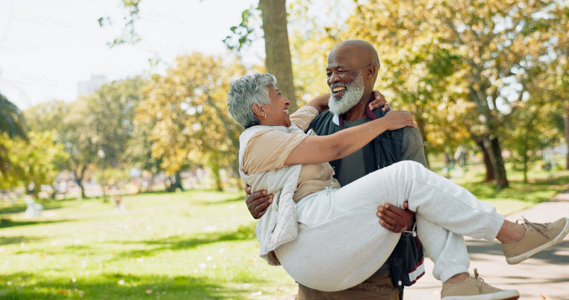 Buy stock photo Senior, couple and carrying in garden with love for bonding with laughter, happiness and romance in nature with affection. Man, woman and playful outdoor with wellness or fun, together and support