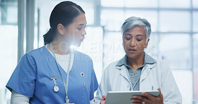 Buy stock photo Healthcare, women and doctor with tablet for discussion about surgery and procedure. Smile, teamwork and female nurse with tech for conversation, analysis and planning before medical operation