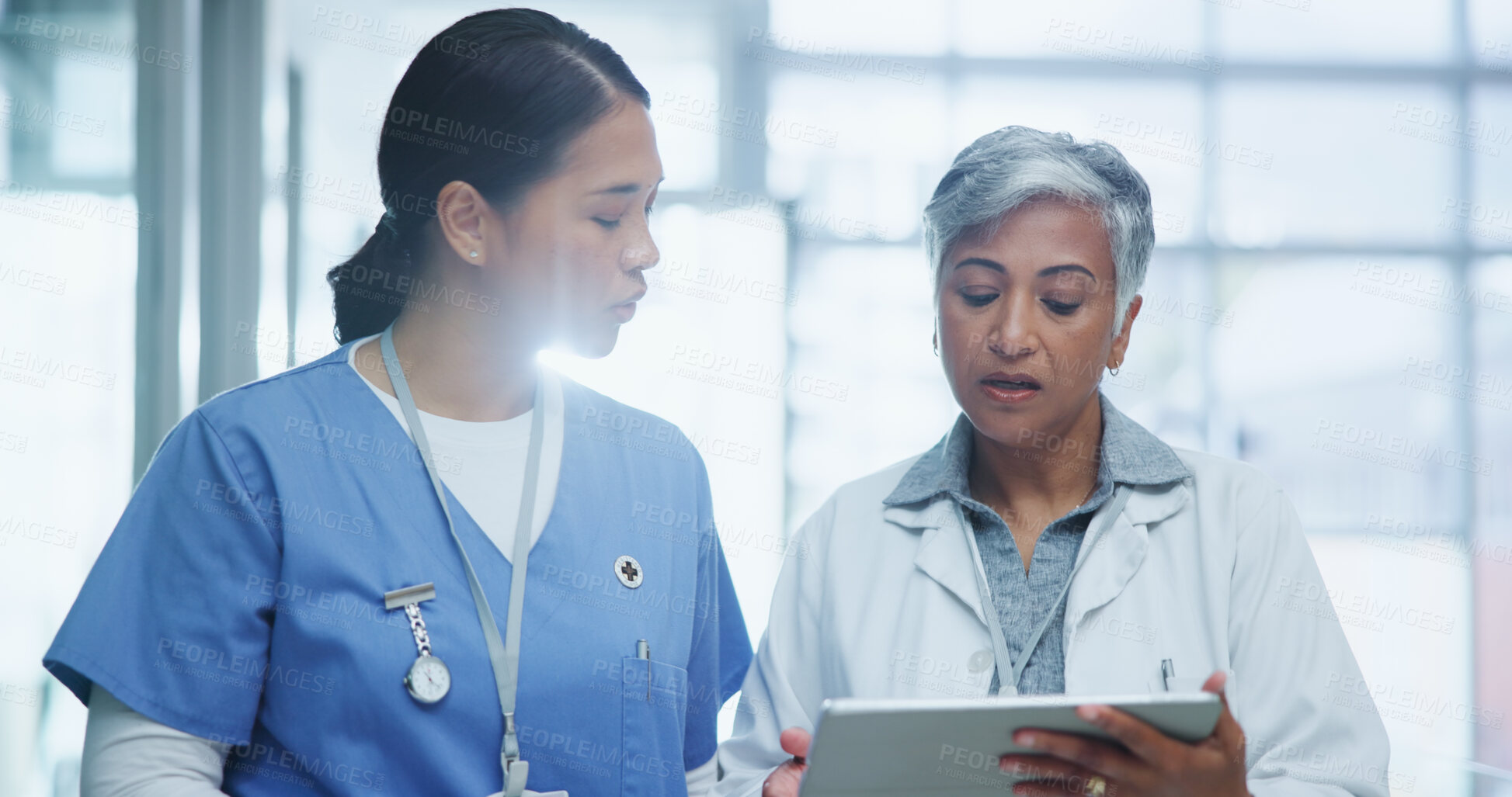 Buy stock photo Healthcare, women and doctor with tablet for discussion about surgery and procedure. Smile, teamwork and female nurse with tech for conversation, analysis and planning before medical operation