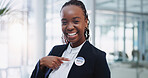 Woman, portrait and vote badge with smile or confidence for election committee or political choice. Support, registration and democracy with button, happy and American government party with pin.