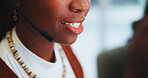 Call centre, black woman and telemarketing in closeup with microphone for customer service in office. Smile, zoom and female person or crm at help desk for technical support, contact and advice