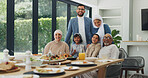 Eid, portrait and smile of family at table in dining room of home together for muslim celebration. Faith, food or religion with children, parents and grandparents in apartment for lunch or dinner