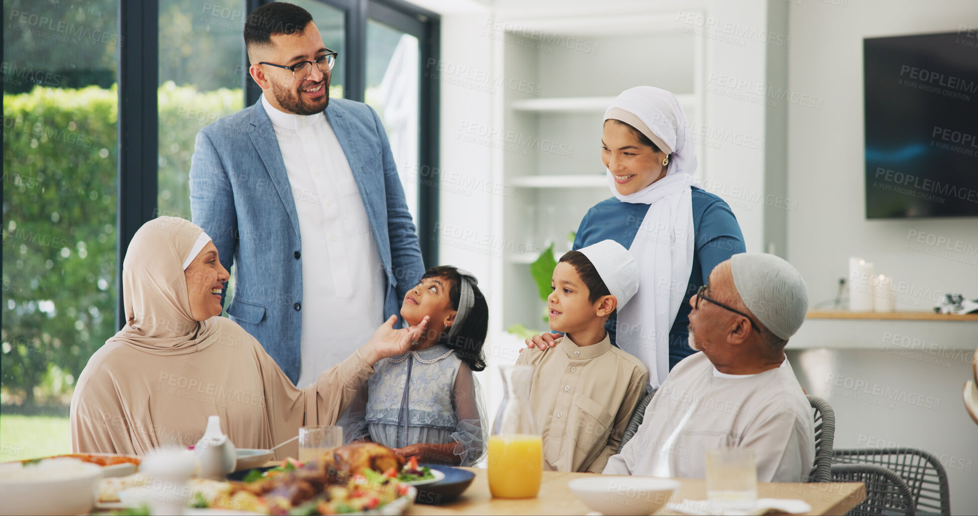 Buy stock photo Islamic, family and dinner in home for ramadan, muslim celebration and food on dining table. Eid mubarak, culture and religious gathering with grandparents, children and mom or dad for bonding