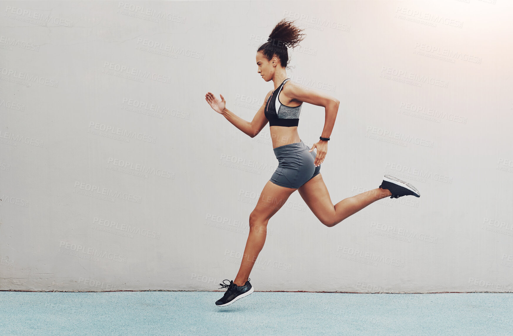 Buy stock photo Fitness, action and jump of running woman for exercise, cardio training or workout outdoors. Fit, active or sport female person or runner in sports motivation for power run or sprint on mockup space