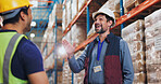 Business, warehouse and men with conversation, friends and industry with inventory, planning and teamwork. Safety, people and guys with stock, hardhat and logistics with shipping, cargo and support