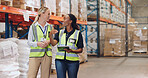 Women, tablet and partner in discussion at warehouse for logistics, cargo and team at global shipping company. People, touchscreen and talk with app for boxes, distribution or supply chain in factory