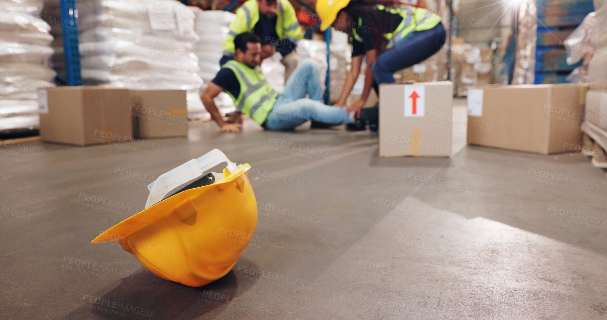 Buy stock photo Accident, fall and hardhat with man in warehouse for delivery, distribution or supply chain logistics. Fail, helmet or injury and person on floor of plant with box for ecommerce, retail or safety