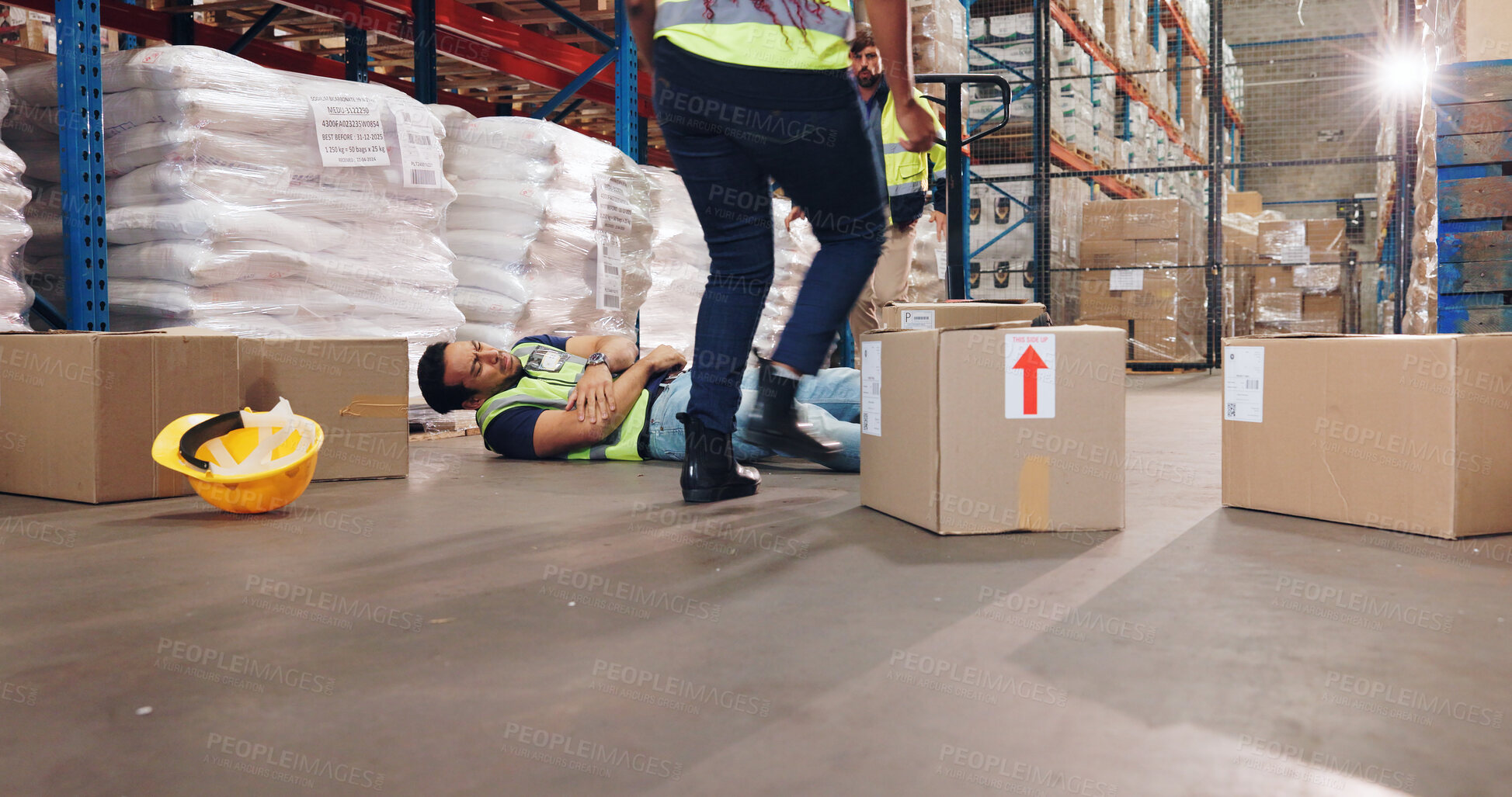 Buy stock photo Accident, fall and stock with man in warehouse for delivery, distribution or supply chain logistics. Fail, injury or mistake and person on floor of plant with box for ecommerce, retail or safety