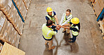 People, warehouse and above with hands packed or smile for teamwork, collaboration and synergy. Employee, deal and happy for logistics at factory for manufacturing, supply chain and distribution