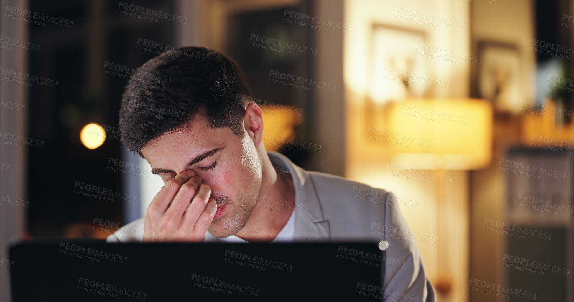 Buy stock photo Businessman, headache and night with laptop in debt, bankruptcy or mistake from stress at office. Frustrated or tired man working late with strain in depression, financial crisis or loss from burnout